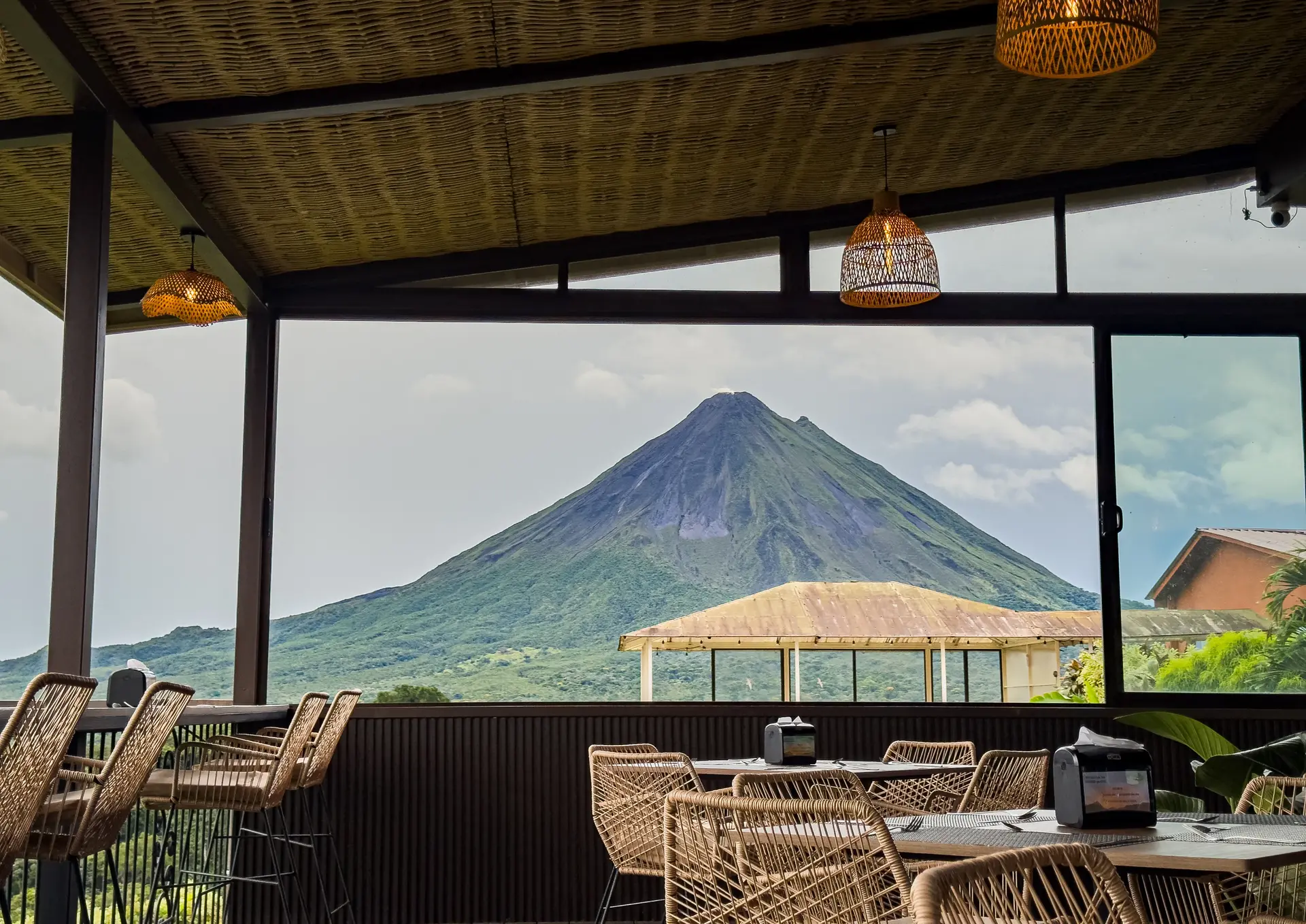Dining terrace overlooking Arenal Volcano at Restaurante Loma Linda